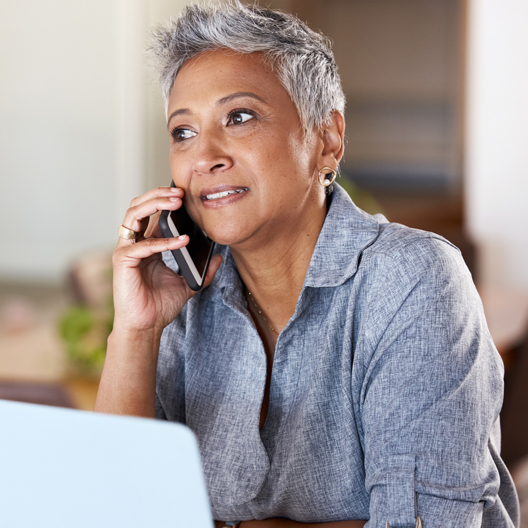 woman talking on the phone at home